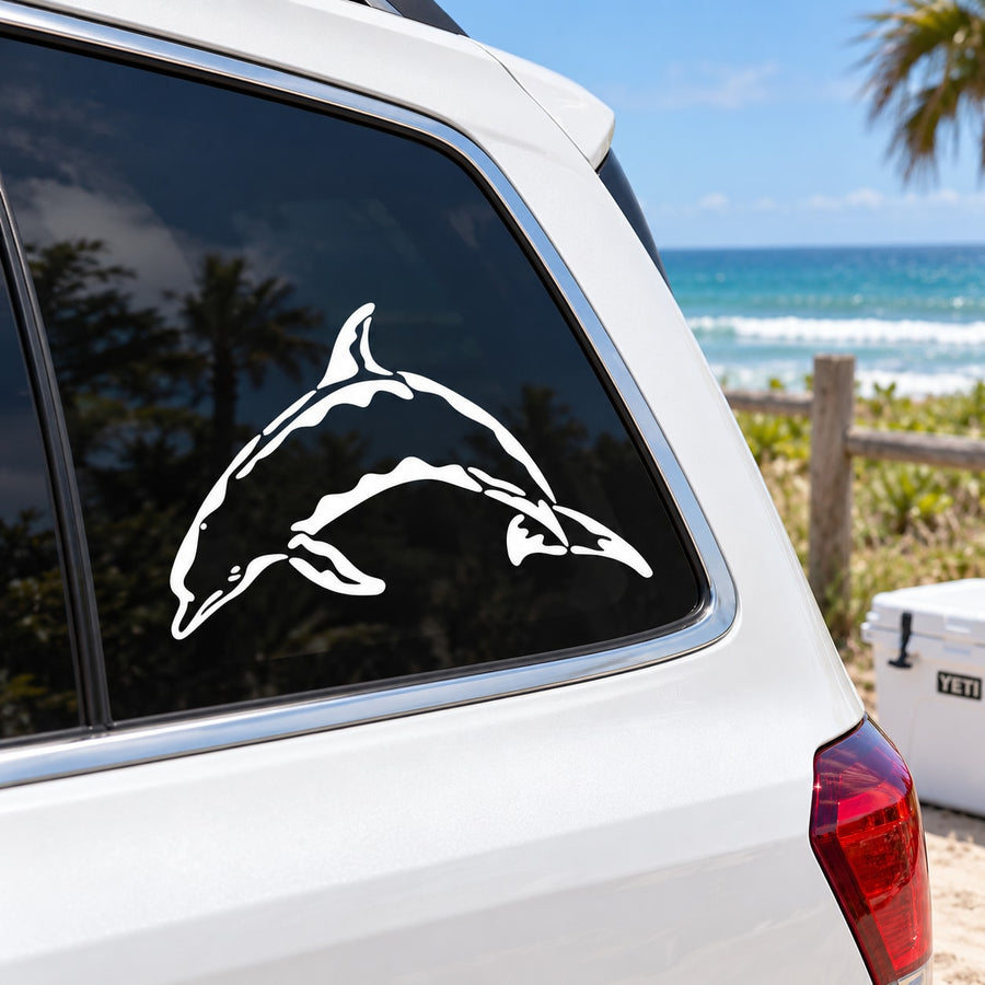 White wavy dolphin decal on car window