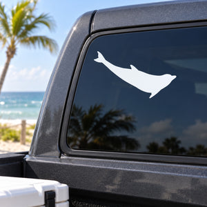White dolphin silhouette decal on car window