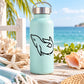 Swimming dolphin decal on mint water bottle