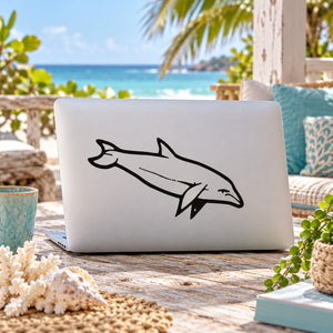 Dolphin decal sticker with black line-art dolphin graphic on a light surface