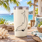 Cream tumbler cup with black diving dolphin decal and stainless steel lid