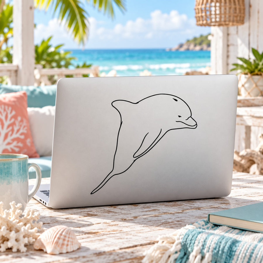 Smirking dolphin line-art decal on laptop lid