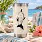 Stainless steel tumbler with dolphin decal on white background