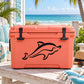 Black dolphin decal on orange hard cooler lid