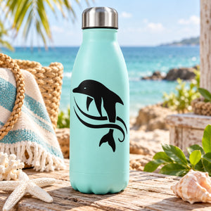 Dolphin and waves decal on teal tumbler