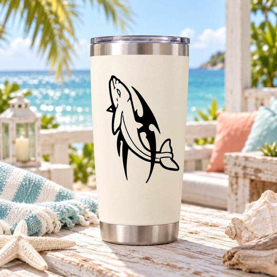 Tribal dolphin decal with spiked outline on a light tumbler