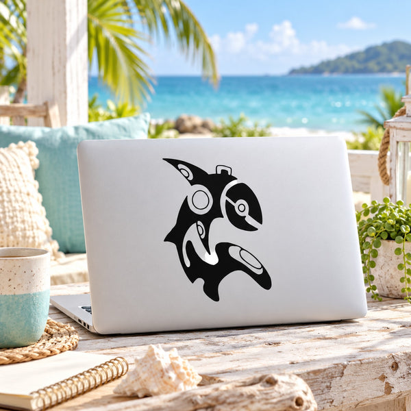 Abstract dolphin decal in black on white laptop lid
