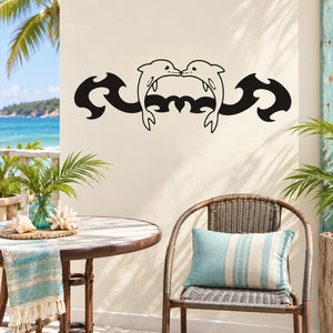 Black dolphin decal with curled fins and heart-shaped details