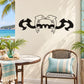 Black dolphin decal with curled fins and heart-shaped details