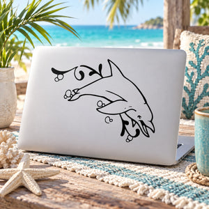 Dolphin and seaweed line-art decal on white surface