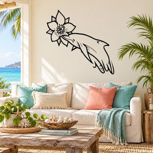Dolphin and flower wall decal featuring a black dolphin with a flower above