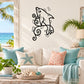Black dolphin wall decal with bubble and seaweed swirl motifs
