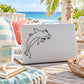 White laptop lid with line-art dolphin and bubbles decal
