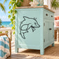 Black dolphin decal with smiling face on light blue cabinet door