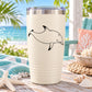 Wading dolphin line-art decal on a white tumbler cup