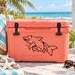 Black dolphin decal on pink cooler lid with latch handles