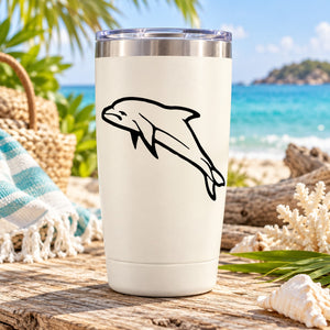 White tumbler with black dolphin swimming decal