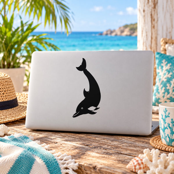 White laptop with black diving dolphin graphic decal on the lid