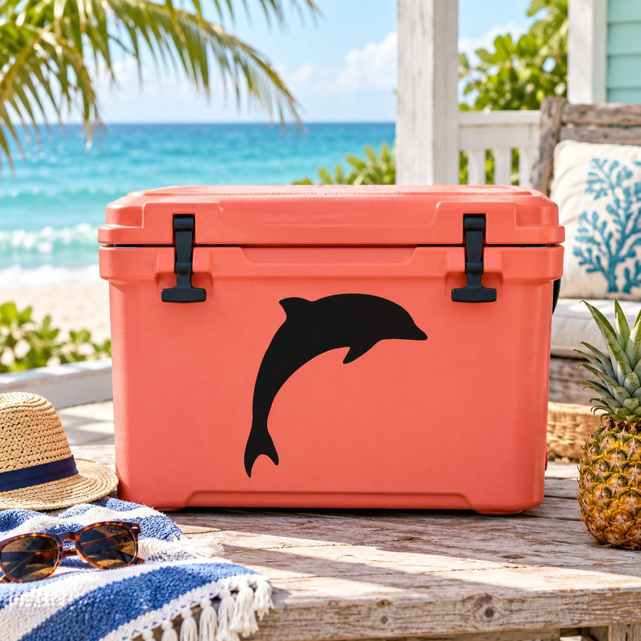 Black dolphin decal on orange hard cooler lid