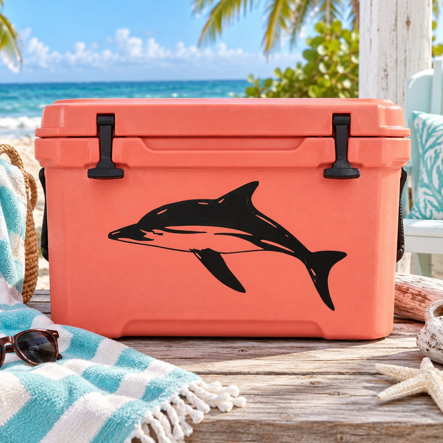 Dolphin swimming decal with dark silhouette and orange accents for a cooler