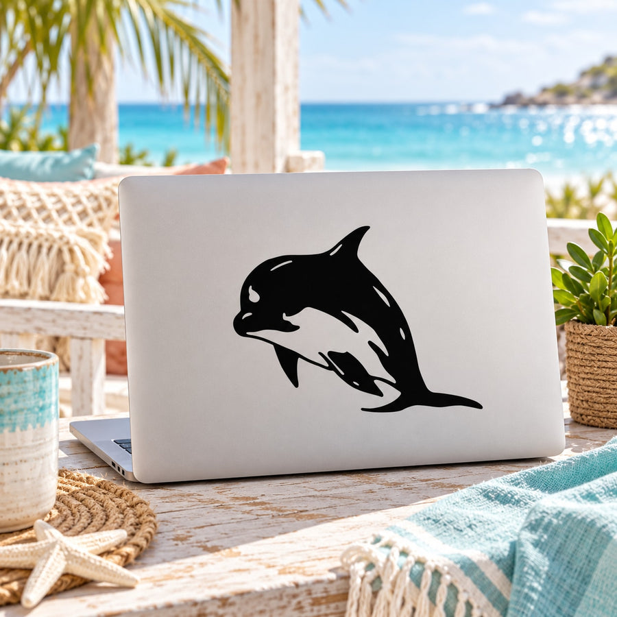 Dolphin gazing vinyl decal, black silhouette design on light surface