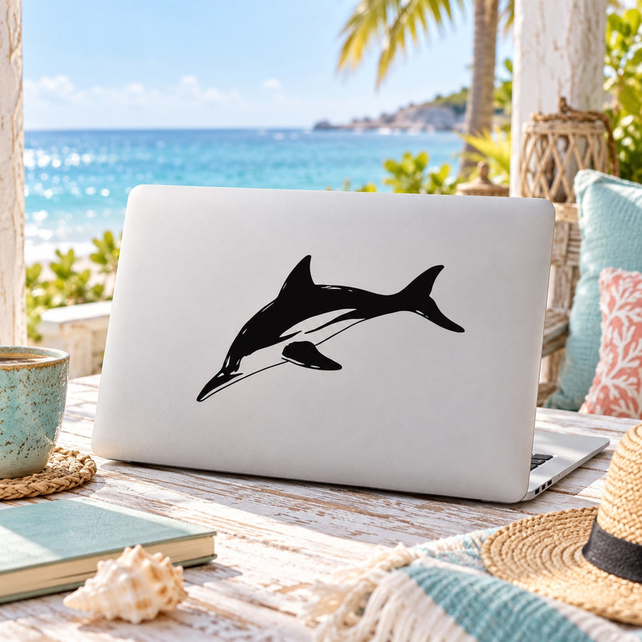 Dolphin diving decal sticker on white laptop lid, black dolphin graphic
