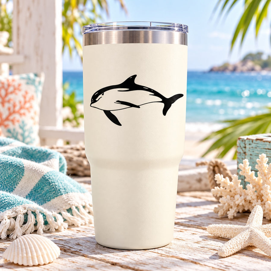 White tumbler with black spinning dolphin decal