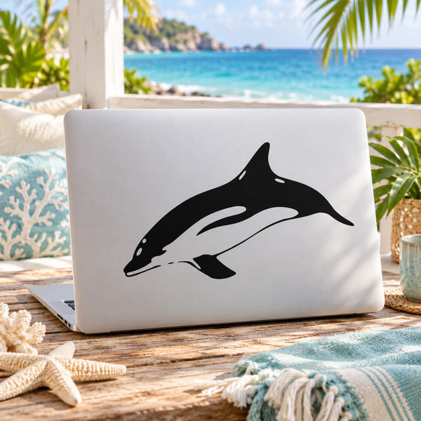 Dusky dolphin decal with black dolphin silhouette on a light surface