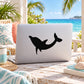 Black up-turned dolphin vinyl decal on white laptop lid