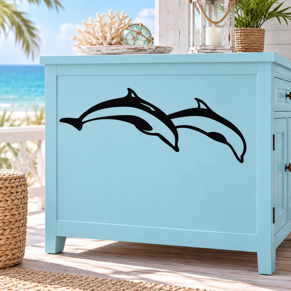 Two dolphins diving decal with two black dolphin silhouettes