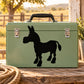 Cartoon donkey silhouette decal, black on light green surface