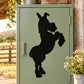 Black standing donkey silhouette decal on light green door panel