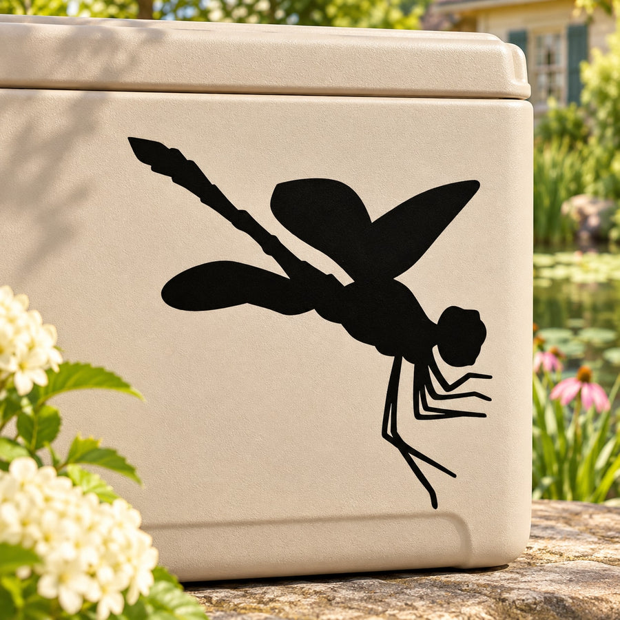 Leaping dragonfly vinyl decal, black silhouette on light beige surface