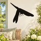 Black dragonfly wall decal with stylized wings and long body