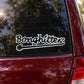 Bonghitters decal sticker with bold script and outline, applied on a car window