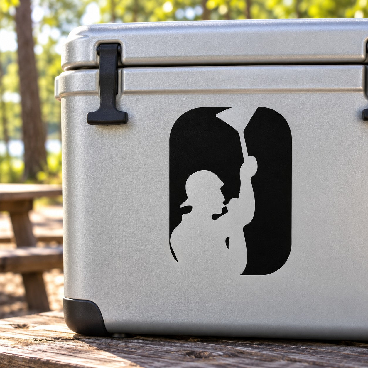 Black beer pong decal with silhouetted player and cup on light gray cooler