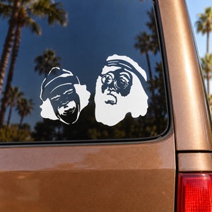 Cheech and Chong decal: two white stylized face profiles on car window