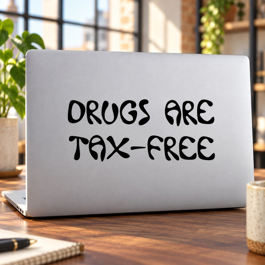 Laptop decal with black 'DRUGS ARE TAX-FREE' text