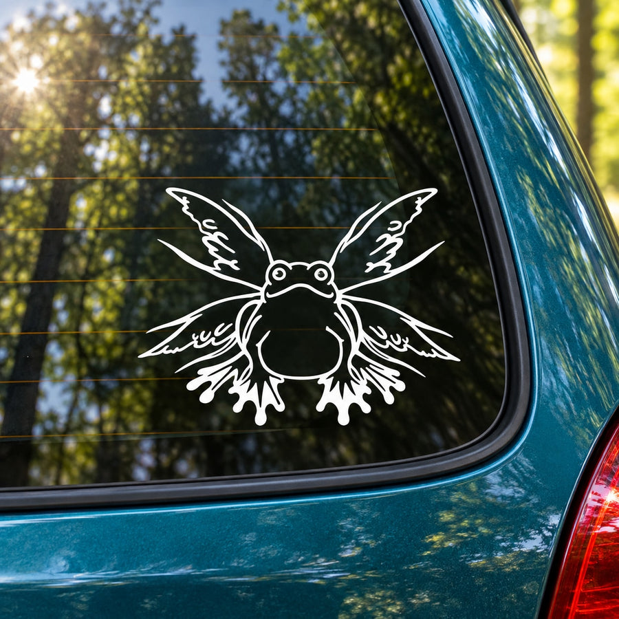 White outlined frog-with-butterfly wings decal on car window