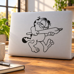 White laptop with black cat joint decal