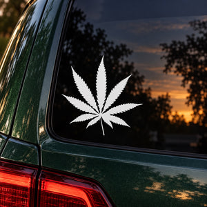 White marijuana leaf decal on car window