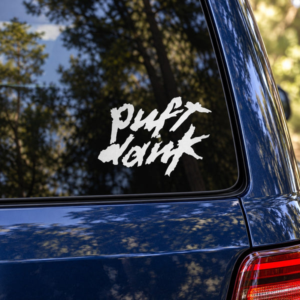 White stylized "Puft Dank" decal on dark car window glass