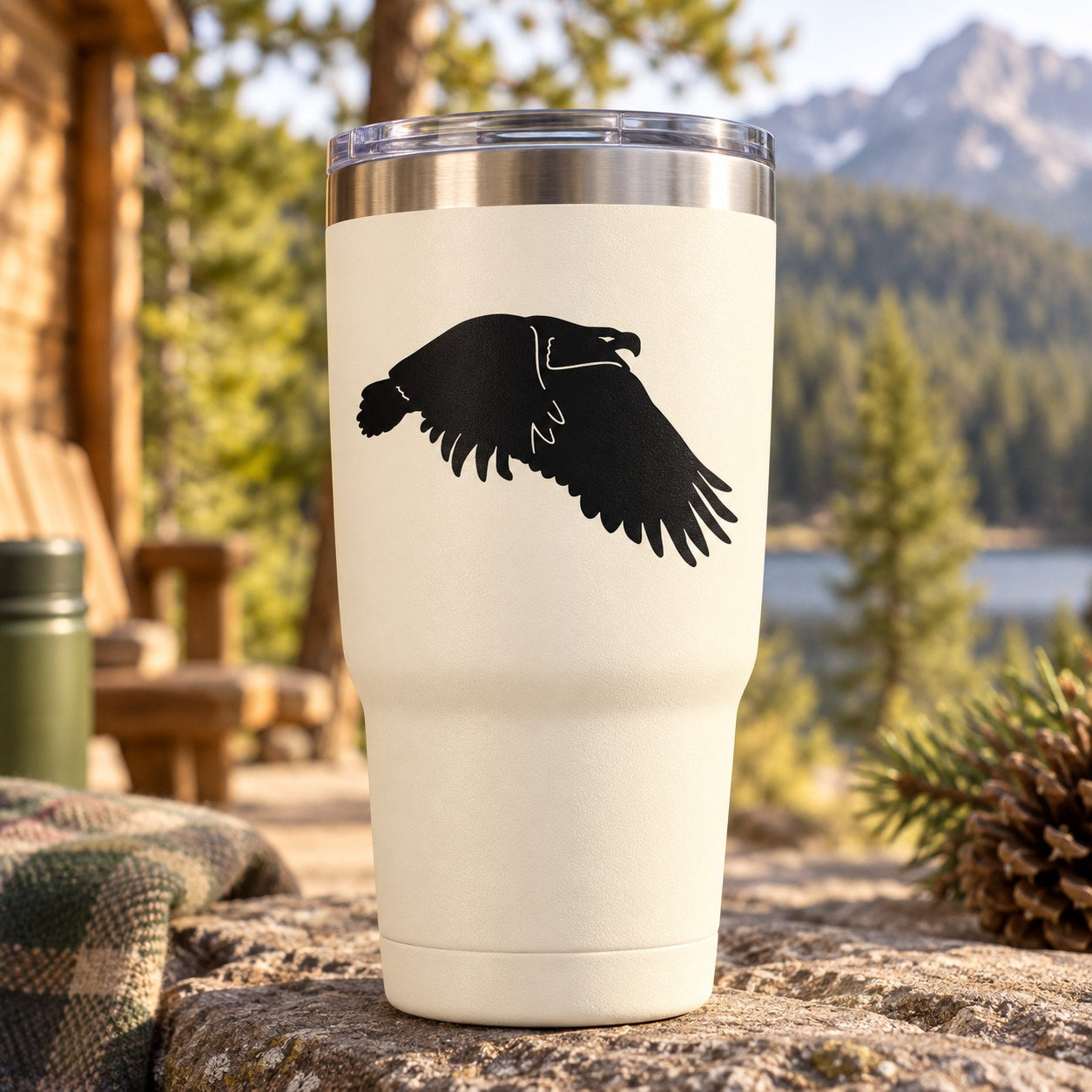 White tumbler with black flying eagle decal