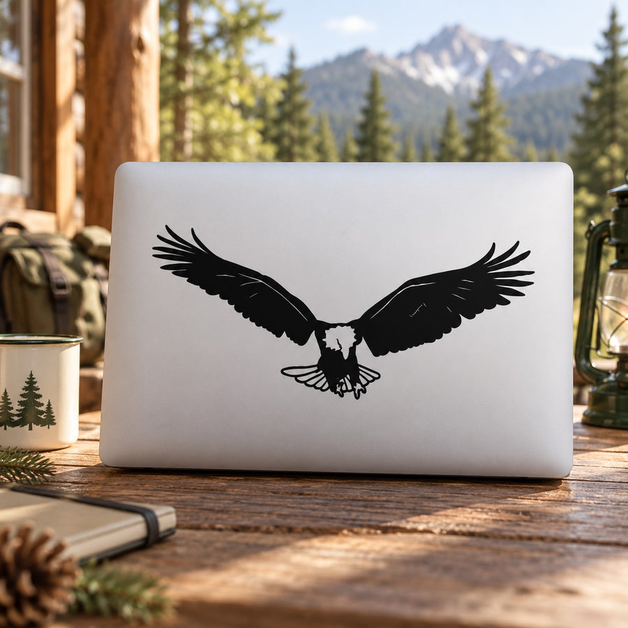 Eagle soaring decal with black flying bird wings on light surface