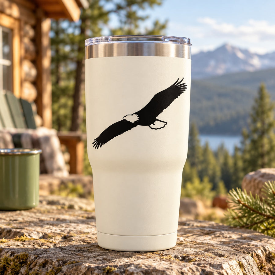 White tumbler with black eagle soaring wings decal