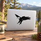 Black eagle decal sticker on a laptop lid