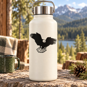 Black flapping eagle silhouette decal on light-colored water bottle
