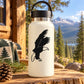 White bottle with black eagle mid-landing decal