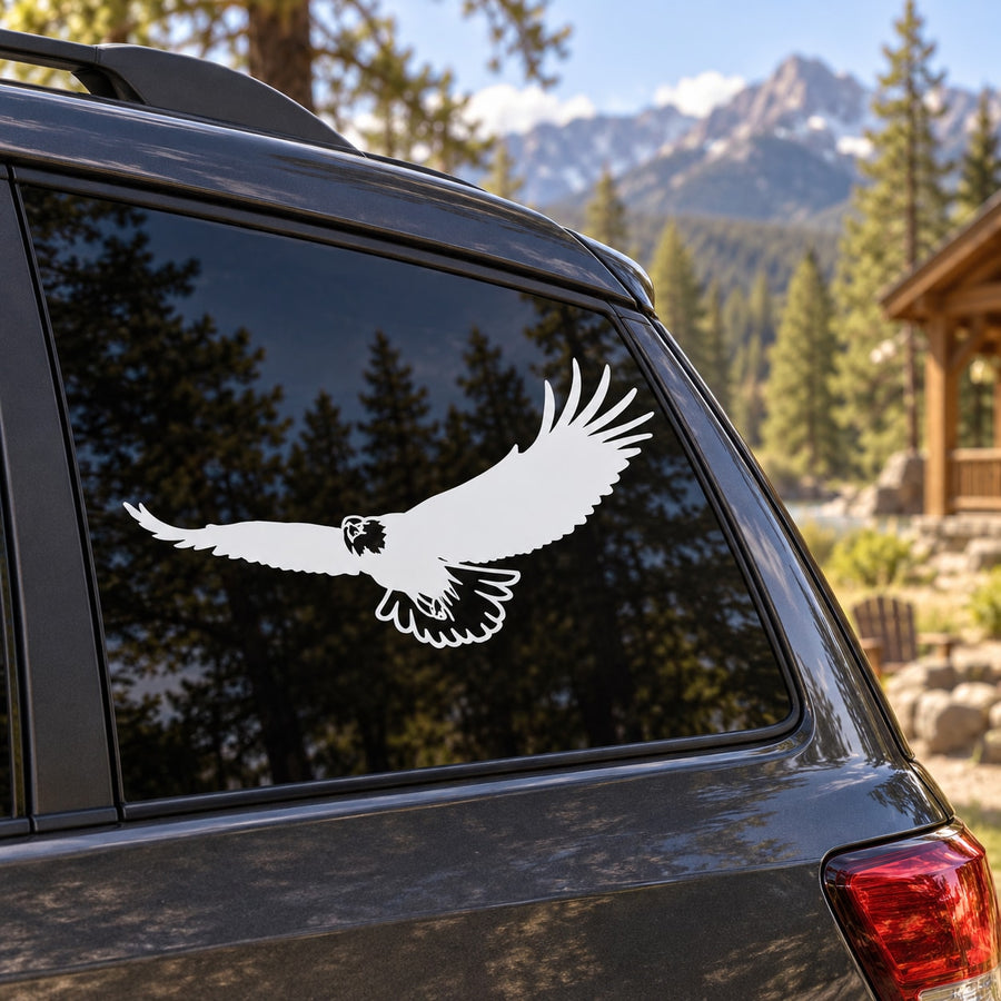White eagle decal on dark car window