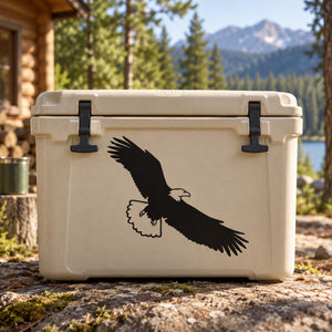 Eagle swooping decal, black silhouette with wings spread on a surface